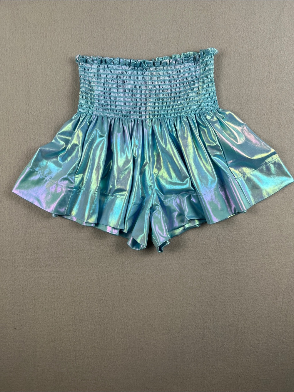 Queen of Sparkles Iridescent Blue Smocked Swing Shorts
Size: XS